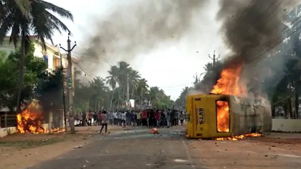 A  bus belonging to an educational institution's bus and a police vehicle were also set ablaze by the protesters in Andhra Pradesh over renaming of district