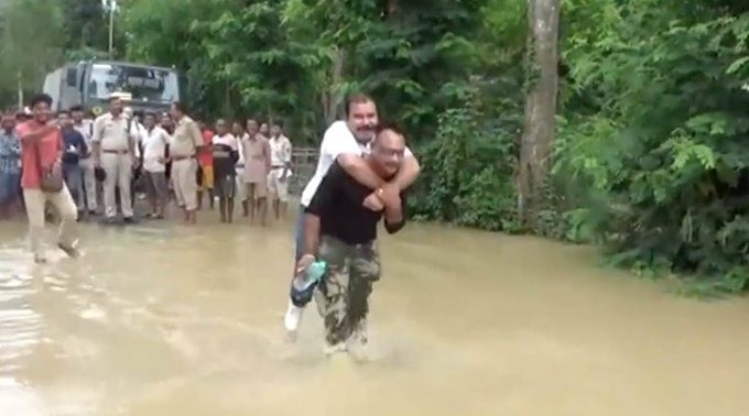 Assam BJP MLA took piggyback ride during flood inspection on Thursday