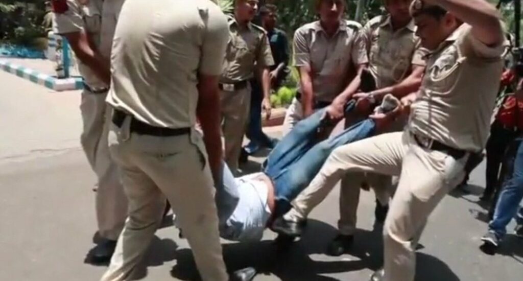 Photo shared by a member of Congress on Twitter and captioned, 'The Delhi police kicks our @IYC President @srinivasiyc when he tries to enter our AICC office. Zero logic and zero grounds for this torture of Congress leaders.'